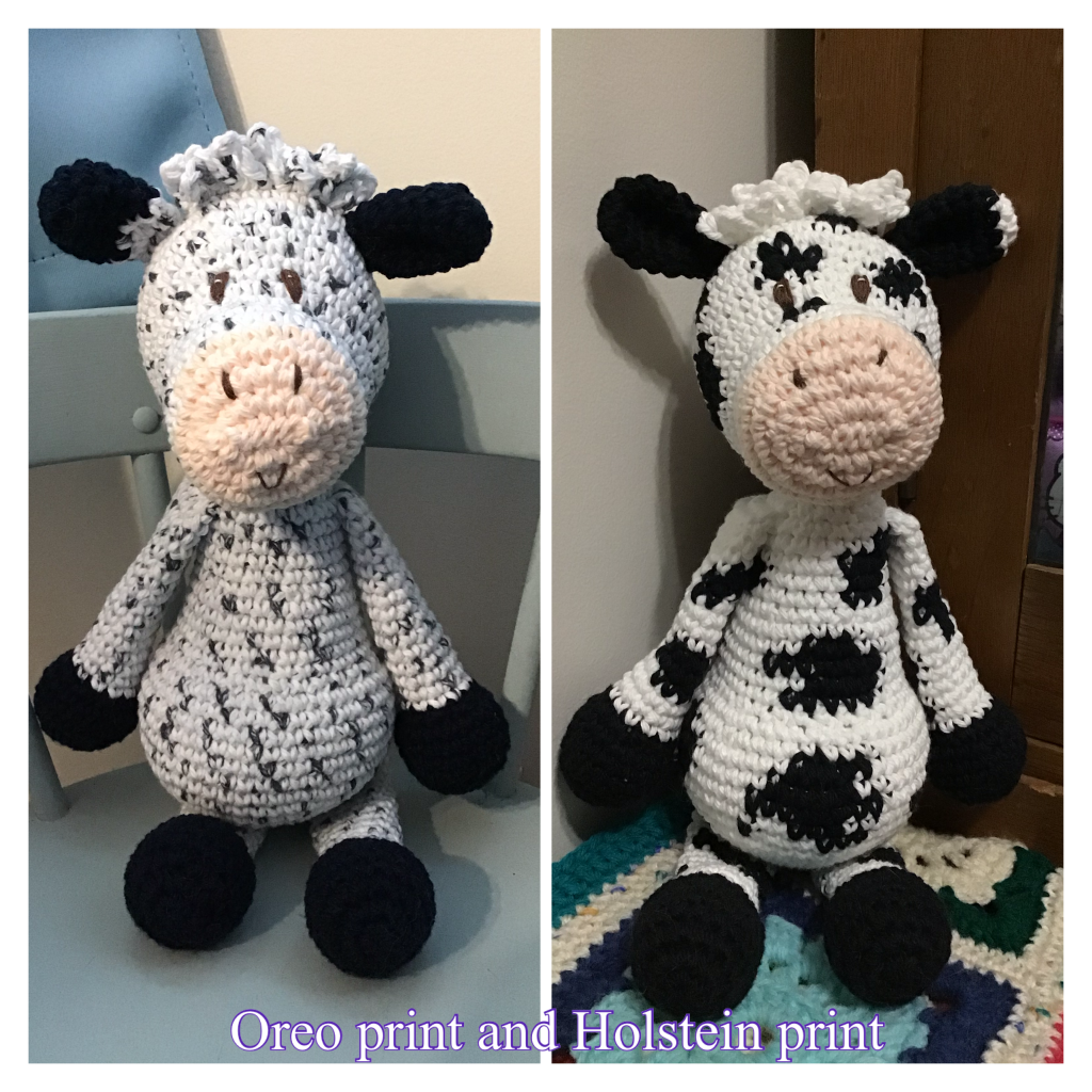 2 cow stuffies, one in "oreo" print the other in holstein print