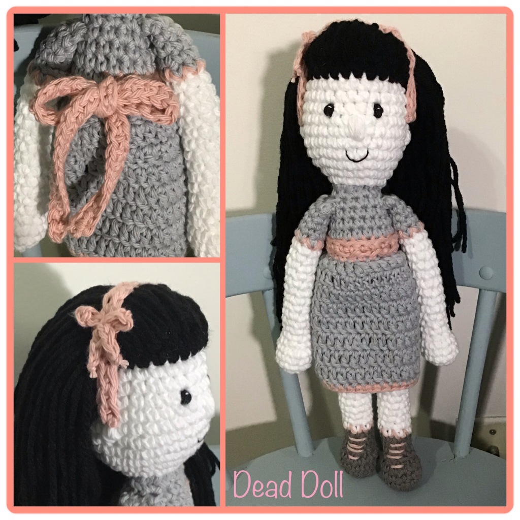 "Dead" doll...whit skin with Victorian outfit and black hair