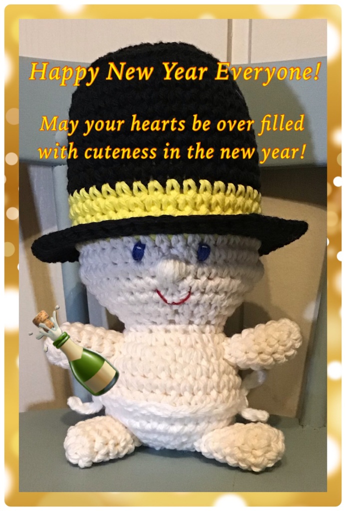 Baby new year. Text reads: happy new year everyone. May your hearts be filled with cuteness in the new year! With a emoji bottle