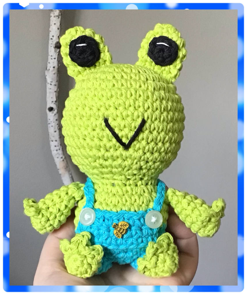 Medium sized frog. My own pattern. This one is in lime green with overalls and buttons!