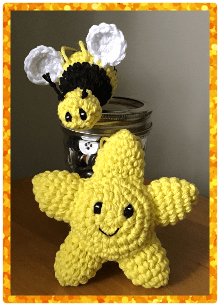 Tiny bumble bee is resting on a jar of buttons. A tiny star is out front of the jar