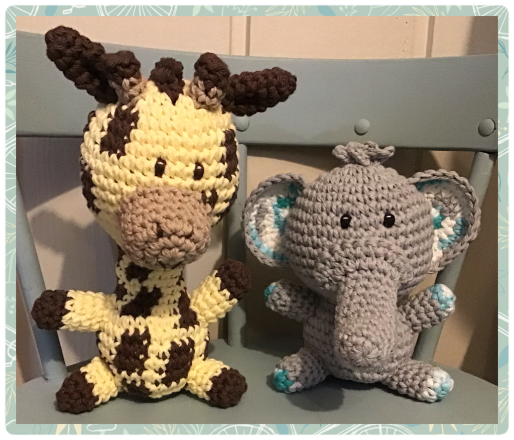 Medium sized crochet stuffed animals of a giraffe and elephant. My own original patterns.