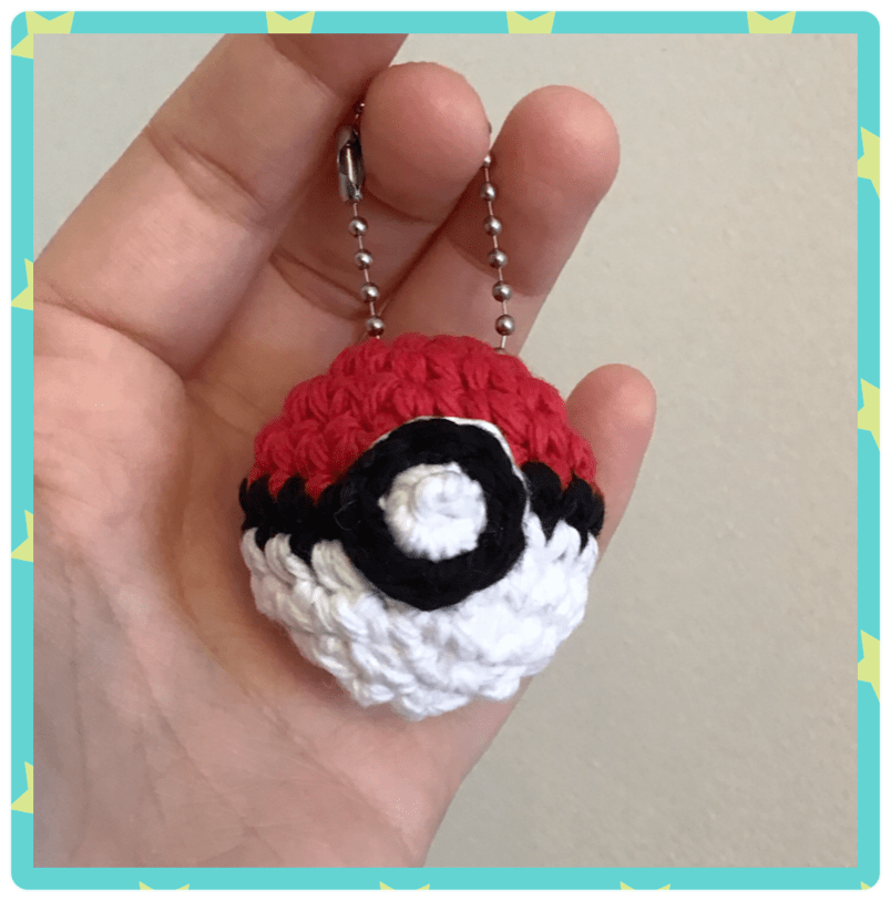 Tiny pokeball being held up by my hand