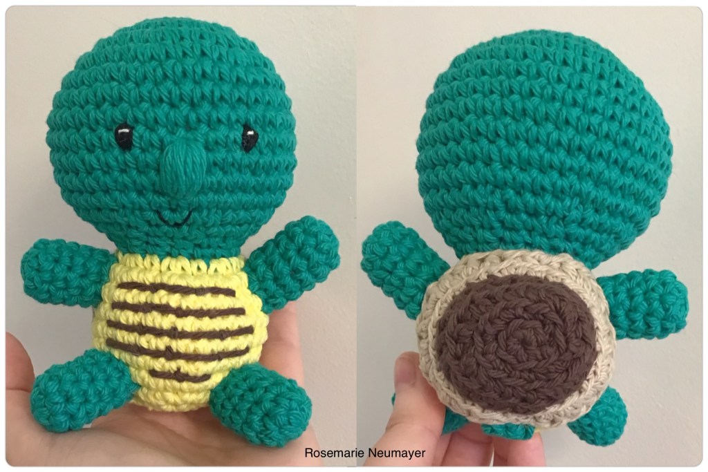 Front and back views of the turtle stuffie. The turtle is green with a yellow tummy and brown shell