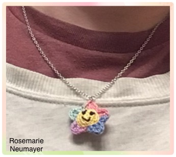 The flower necklace on a neck