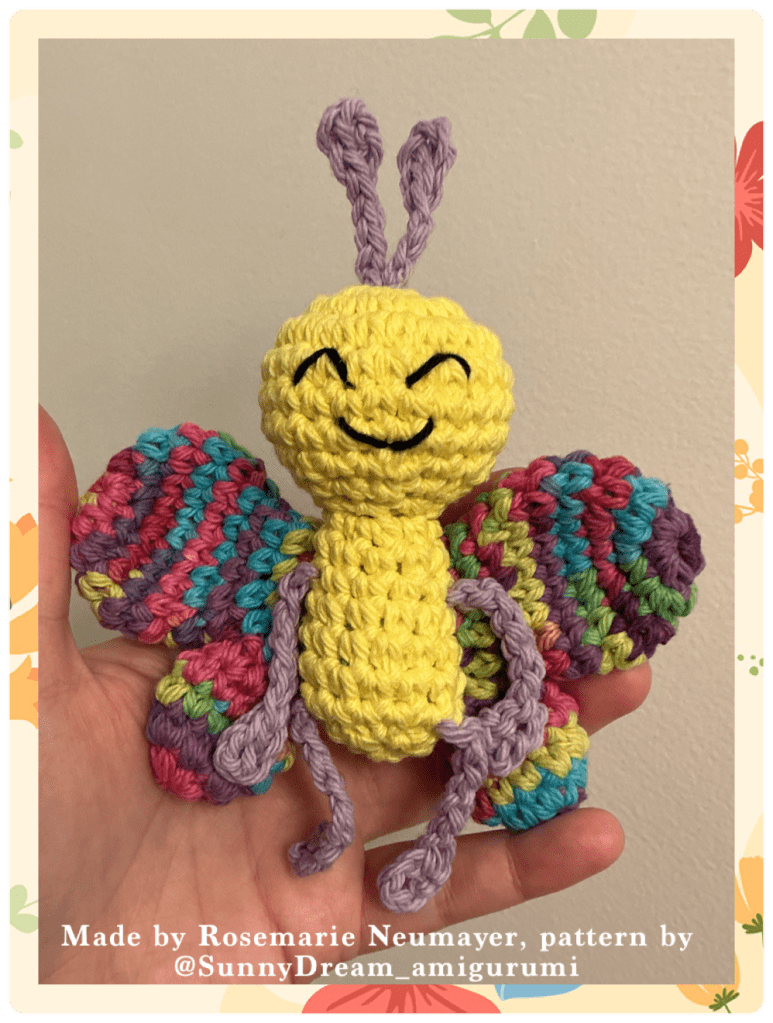 A super cute hand sized butterfly with a yellow body and rainbow wings. Pattern by SunnyDream_amigurumi 
